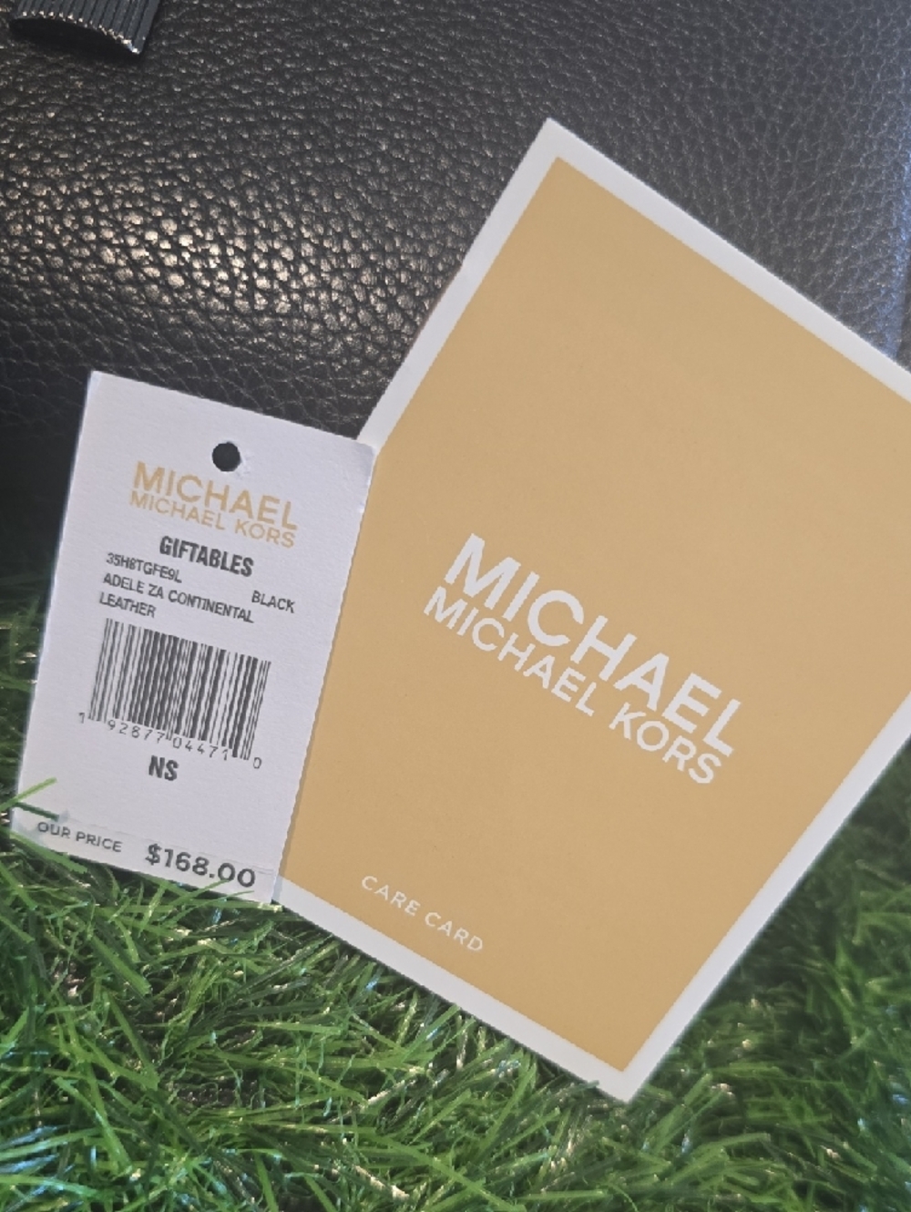 Michael Kors Black Pebbled Leather Zip-Around Wallet with Padlock Accent - Picture 3 of 4
